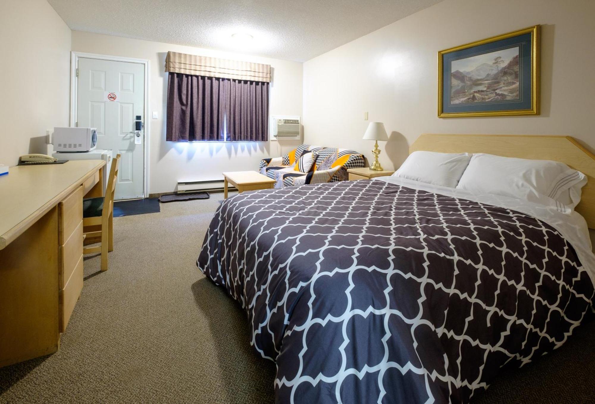 Perfect Inns & Suites Weyburn Room photo